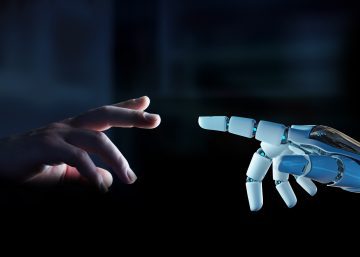 Human hand and robotic hand reach toward each other in a dark scene, suggesting connection between people and AI.